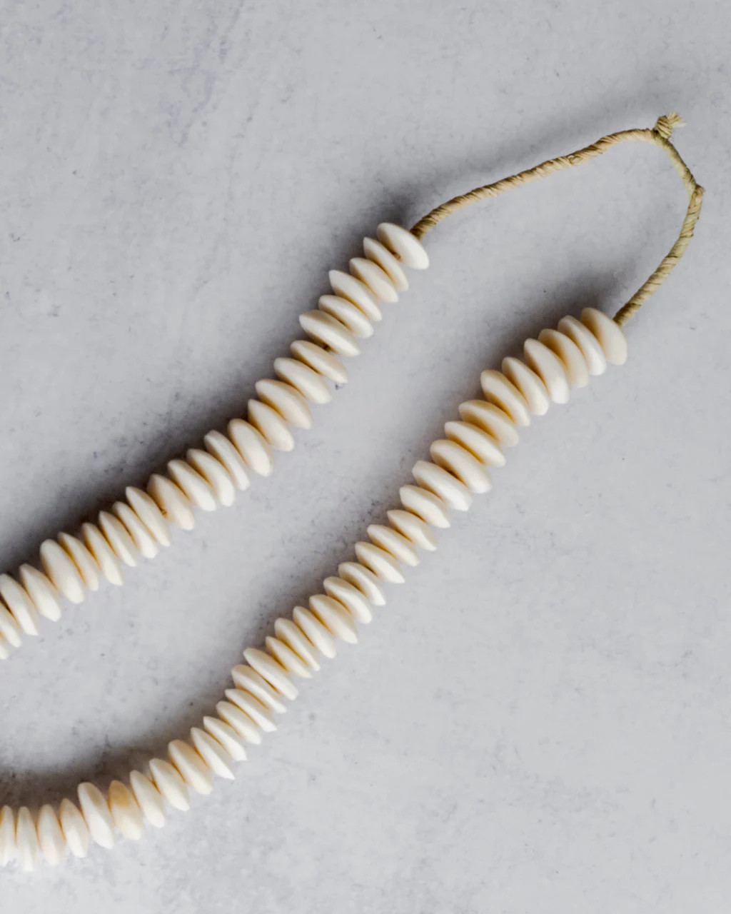 White Saucer Bone Beads | Mitch Allen Interiors