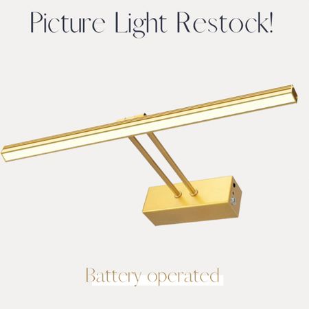Gold and brass battery operated picture light 

#LTKunder50 #LTKhome #LTKFind