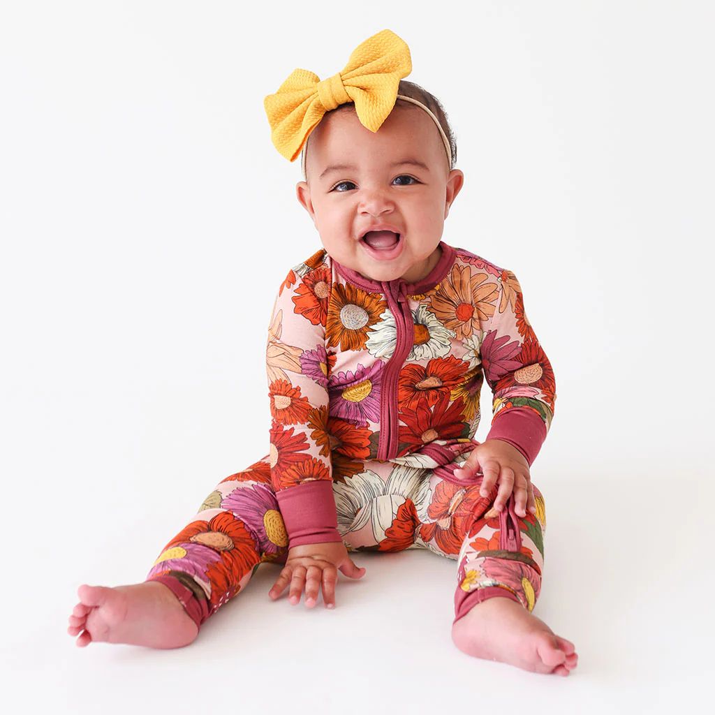 Floral Pink Baby Convertible Sleeper | Della | Posh Peanut