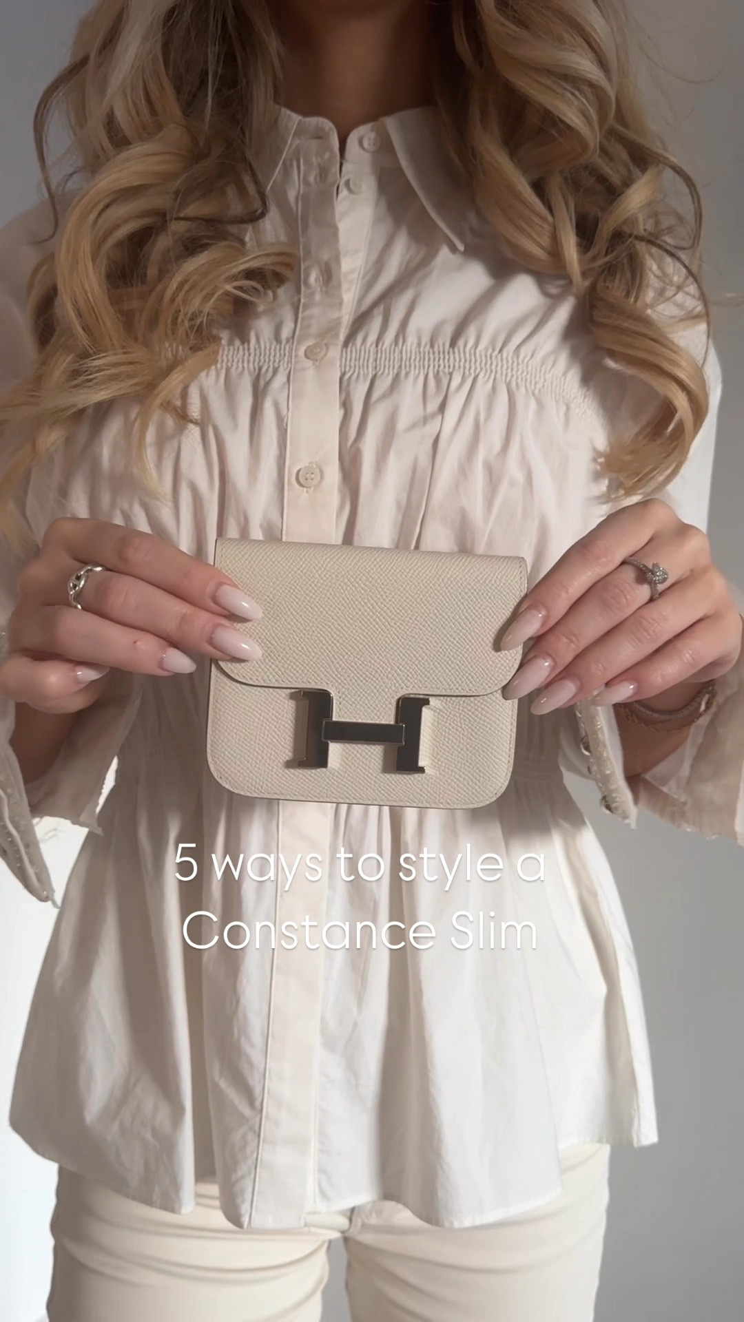 5 ways to style a Hermes Constance Slim wallet - my favorite belt bag that can act as a mini bag too. I love the versatility of it - styling it with adjustable kelly belts in brown and blue color as well as with neutral white belts that also can act as a shoulder strap. Adding an extra touch with a long silver chain detail as well as a silk scarf. Enjoy the inspiration! 🤍 the Hermes colors of the items used: 
Constance Slim: Craie, palladium hdw, Epsom leather. Kelly belt 1: Gold with palladium hdw. Kelly belt 2: Blue Glacier with palladium hdw. 

#LTKStyleTip #LTKItBag