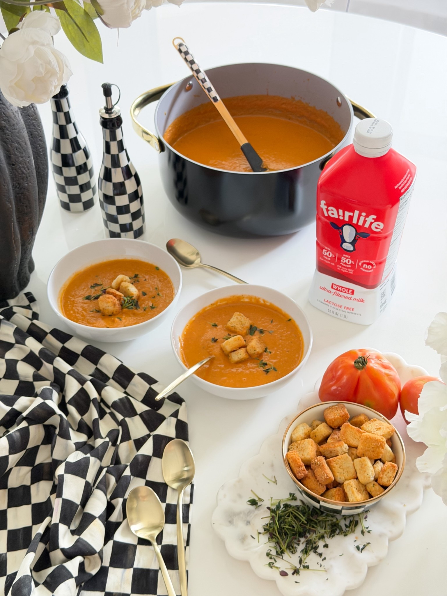 It’s Soup Season!

6 Ingredient Creamy Tomato Basil Soup

6-8 heirloom tomatoes, quartered
1 small onion, quartered
3 TBSP Olive Oil
1 cup fairlife whole ultra-filtered milk
4-5 garlic cloves 
4-5 fresh thyme leaves 
1/3 cup pesto 

salt & pepper to taste

1. Quarter tomatoes and onion.
2. In a large pot, combine the tomatoes, onion, olive oil, garlic, thyme, and salt and pepper. Cook on low-medium for 20-30 minutes or until the tomatoes begin to burst and release their juices. Let cool slightly.
3. Add the milk and pesto. Blend until smooth with an immersion blender. Heat again over medium heat until bubbling.  Season the soup with salt and pepper. Top with fresh basil and croutons.  Enjoy! 

#LTKfoodie #LTKHome