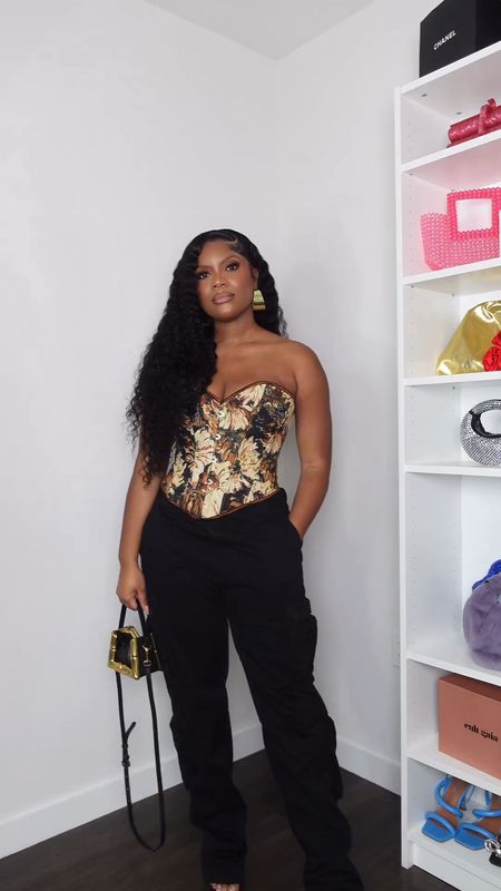 Fall style, fall trend, corset top, brown corset, cargo pants, black cargo pants, curly hair, Brandon Blackwood purse, gold hoop earrings, black and gold purse, black heels, fall top 

#LTKSeasonal #LTKstyletip