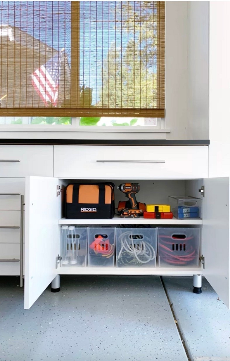 Storing outdoor cords and Halloween décor accessories in labeled bins keeps everything easy to find and tangle free. Having a system for lights, extension cords, and seasonal décor makes setup simple and cleanup stress free.

#LTKHome #LTKHoliday #LTKHalloween
