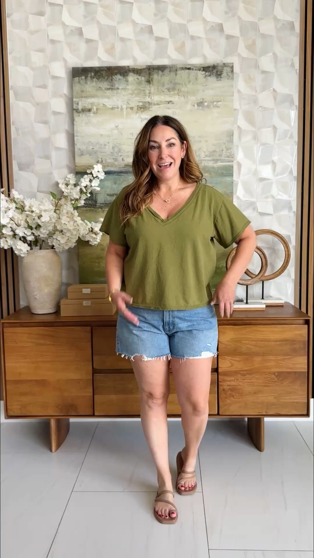 Your everyday summer uniform found it 🧢 This relaxed olive v-neck tee pairs so effortlessly with cutoff denim shorts — casual, cool, and totally put together.

Tee: large
Shorts: size up if inbetween, 32#LTKfindsunder100 #LTKstyletip

#LTKOver40