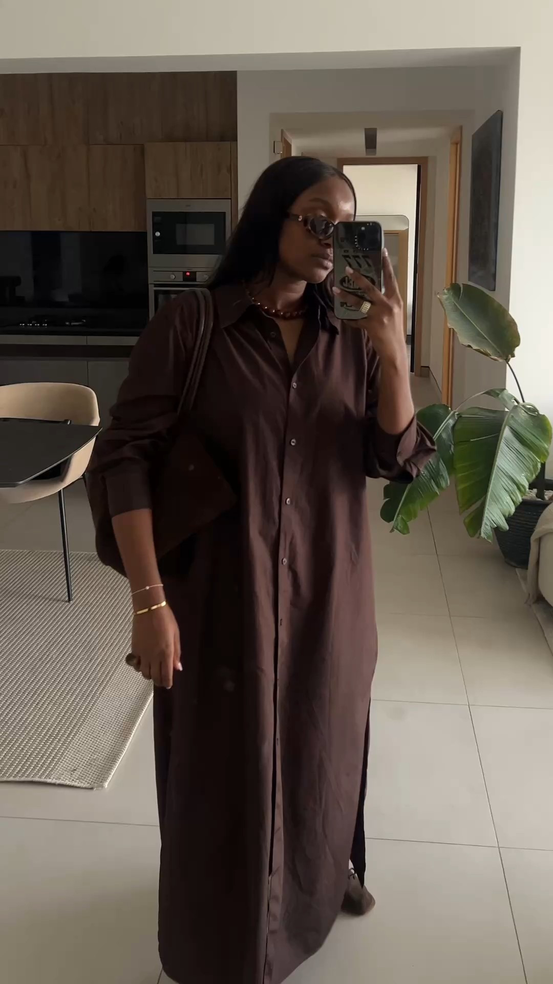 transitional style outfit from arket styling oversized shirt dress with chocolate brown accessories 

#LTKbag #LTKeurope #LTKmodest