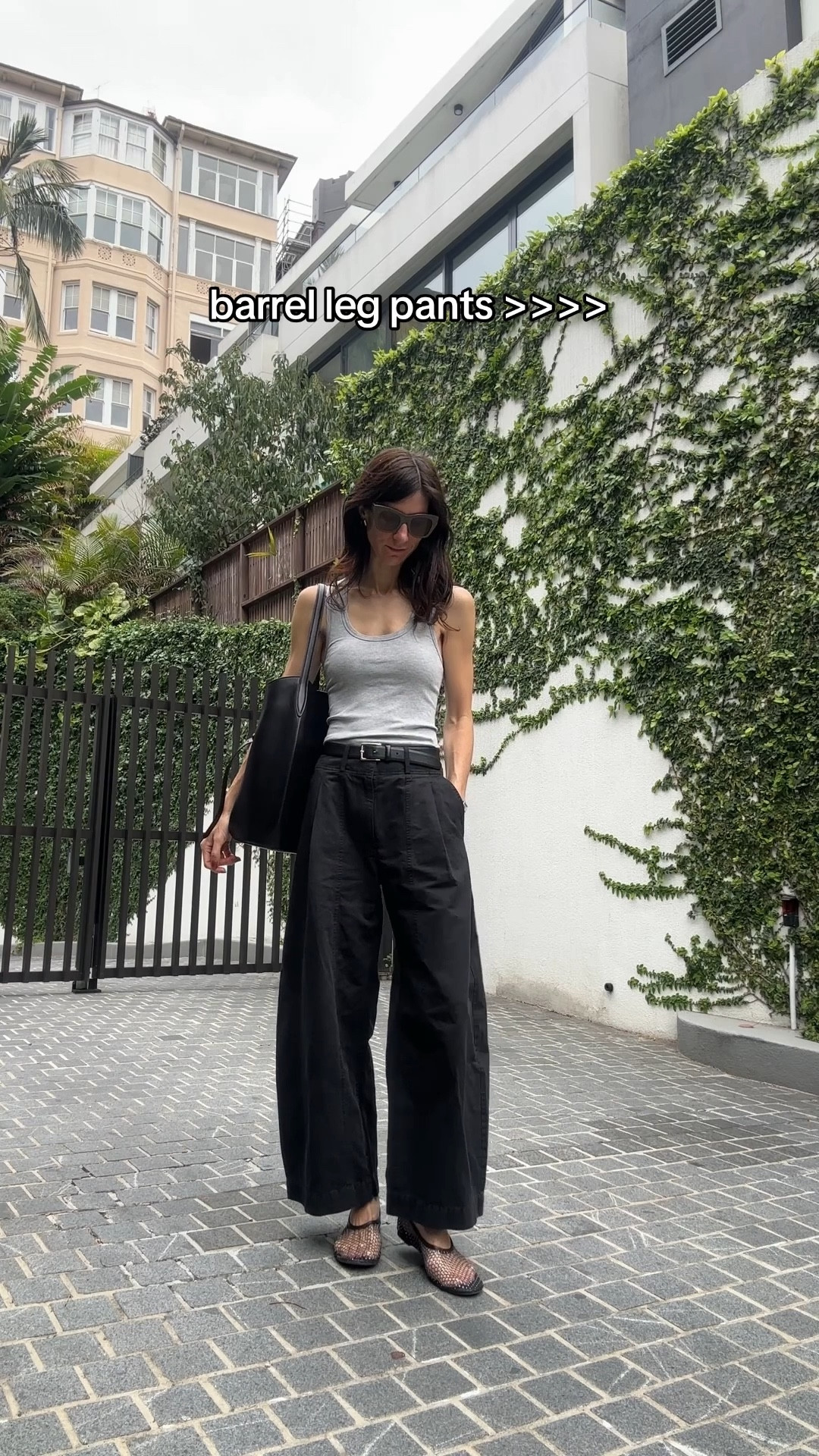 Wearing tank in size S, pants in size us2, belt in size 70 and shoes in EU40