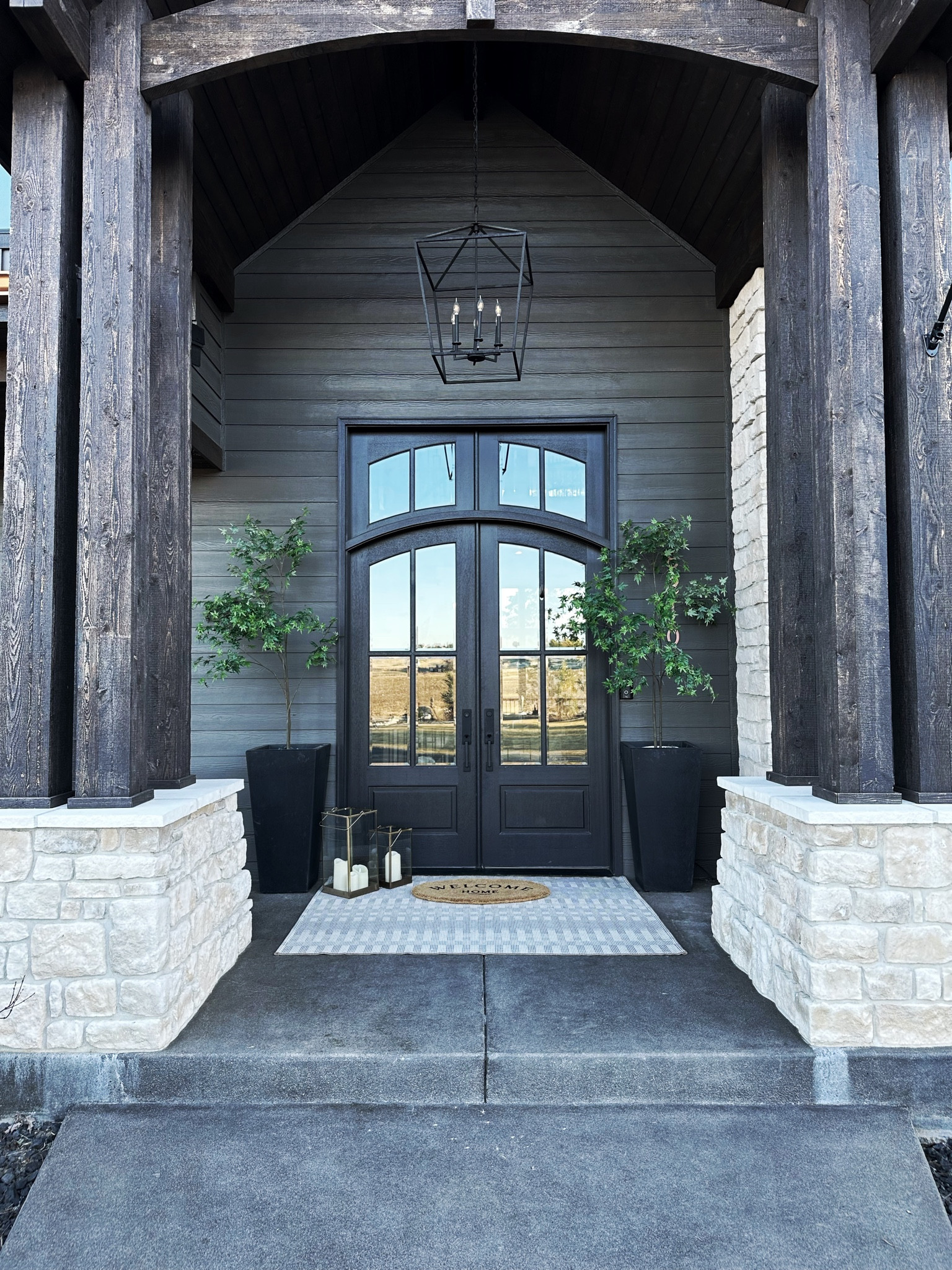 
Shop my spring front porch. 

Porch decor. Entryway decor. Front door trees. Front door rug. Entry design. Flower pots. Planters. Larger planter pots  

#LTKhome #LTKFind #LTKunder100