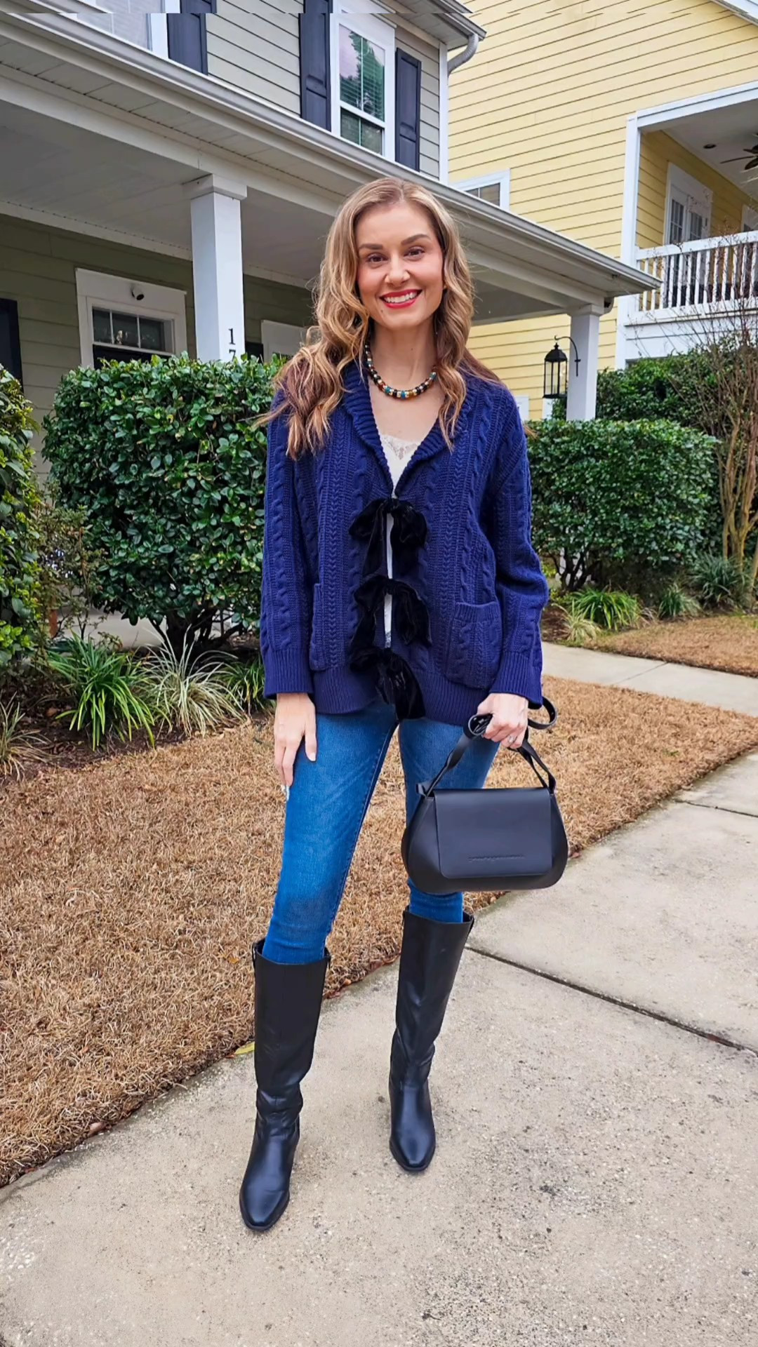 OOTD but make it cozy chic 💙This cable knit with the velvet bow cardigan is giving comfy + polished and I’m obsessed. The texture, the bows, the fit… it’s that effortless throw-on-and-go piece that still feels put together.Styled it with denim, tall boots, and a close-up moment for my gorgeous necklace from @holstandlee ✨Wearing @renttherunway (aka my favorite way to switch up my closet).Use code RTRXRSZMIDT50 to save 50% off your first month and thank me later 😉#renttherunway #cozychic #ootd #rtrpartner 

#LTKSaleAlert #LTKootd
