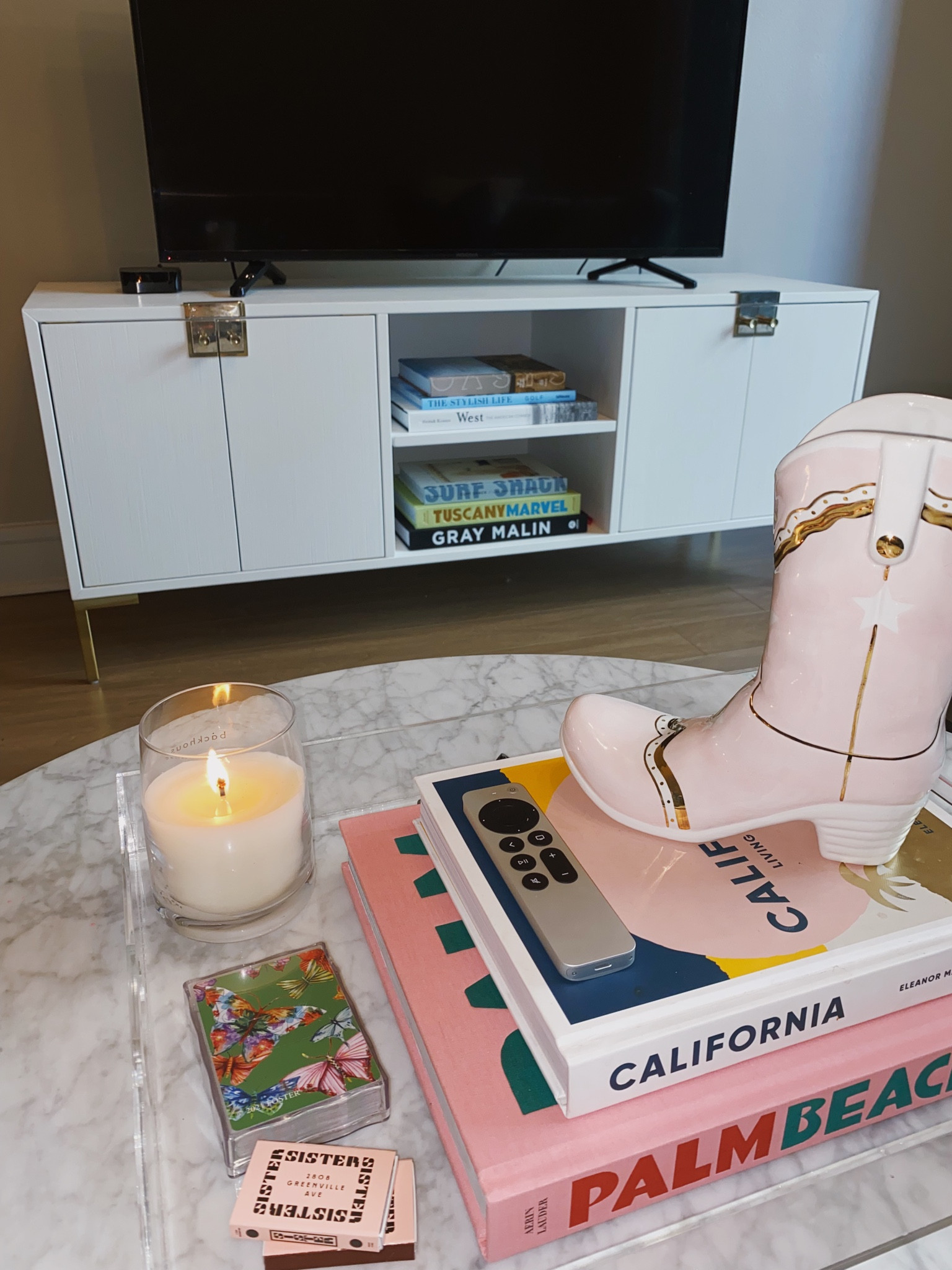 media console & coffee table decor!! 🩷

backhouse fragrances - hands down the best candles ever !!! 
they smell amazing, are simply designed, and the candles are hand poured in newport beach - my hometown !!! i’ve ordered each candle & love them all - but I especially love harriet’s tree, colony,  and lido 🫶 


the best gift for your bestie, gift for mom, new homeowner gift, or a great corporate gifting idea  💌

fall decor, entry table, console table, coffee table books, cowboy boot decor, palm beach book, butterfly decor, apartment living, console table styling, california coffee table book, amazon books, amazon home decor, fall home finds, west book, costal cowgirl decor, apple tv, oasis book, tuscany coffee table book, assouline books 

#LTKSeasonal #LTKU #LTKhome