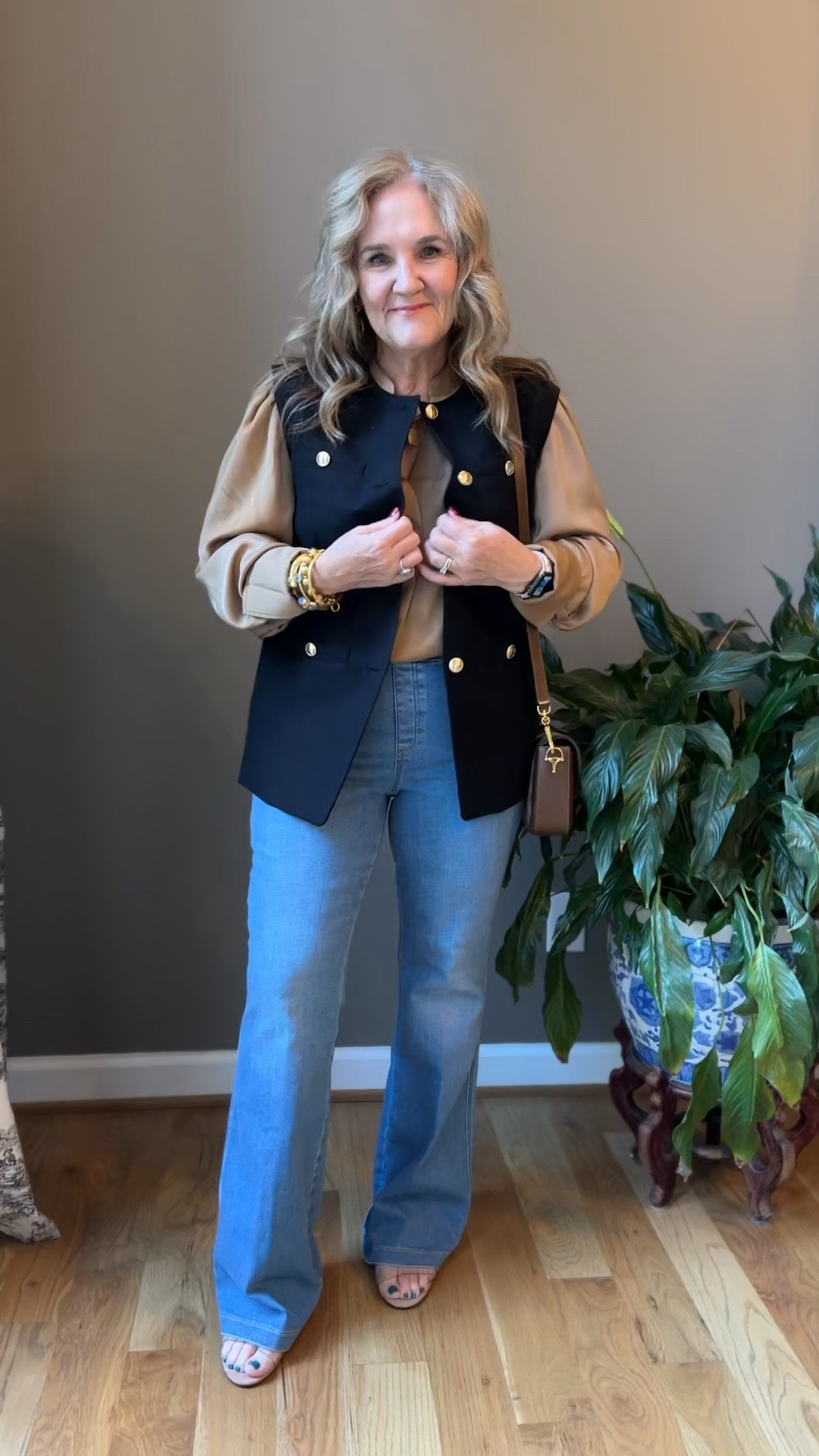 Elevated casual outfit with spanx flare jeans. Order your larger size in the jeans. I’m in a large. 15% off code NANETTEXSPANX 
Vest size down. It does run roomy. I’m in an 8
Tan blouse is a lovely fall layering staple. I’m in a medium. 
Pair with a sandal now or a bootie later. I’ll link both. My boots I always order a 1/2 size larger. 

Need a new bra? Dropping my new favorites. Use my code NANETTEFS15 15% off. Support and comfort. Eby bras are the best! 
Dolce vita boots Schutz clear strap sandals light wash jeans Talbots vest long black vest 

#LTKMidsize #LTKOver40 #LTKSeasonal