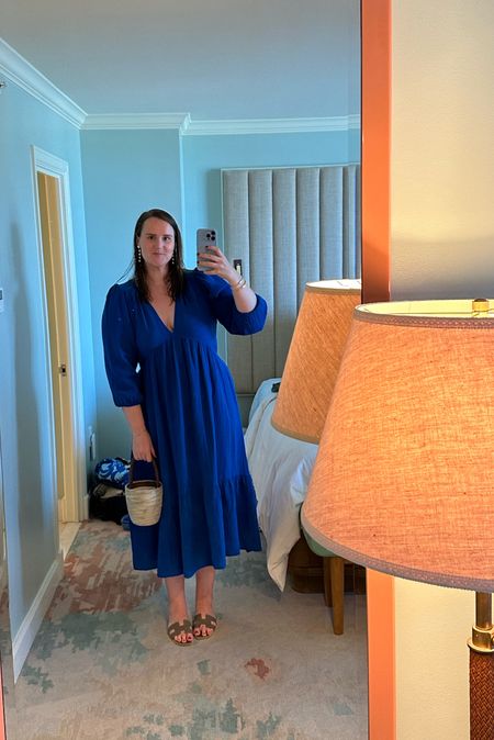 This Xirena Blue midi dress is back in stock in all sizes. Here I am wearing it on vacation in Florida. The perfect beach coverup or casual dinner dress. I am in size XL  