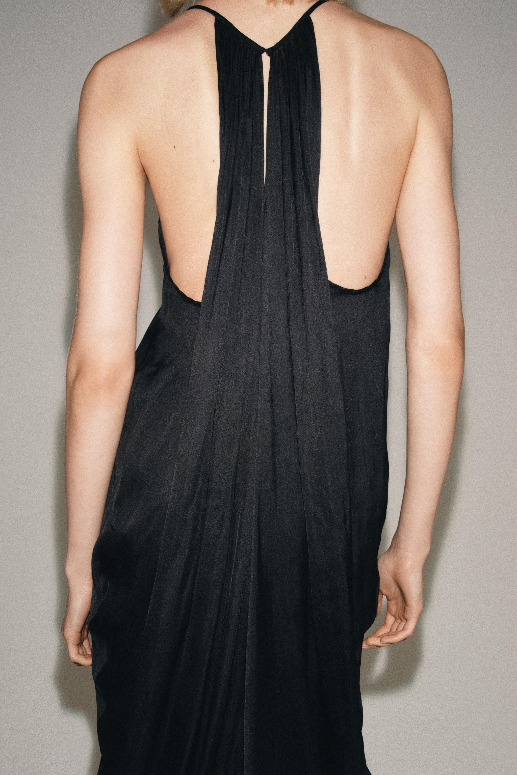 ZARA WOMAN COLLECTIONDress with a V-neckline and spaghetti straps. Straight hem. Button closure a... | Zara US