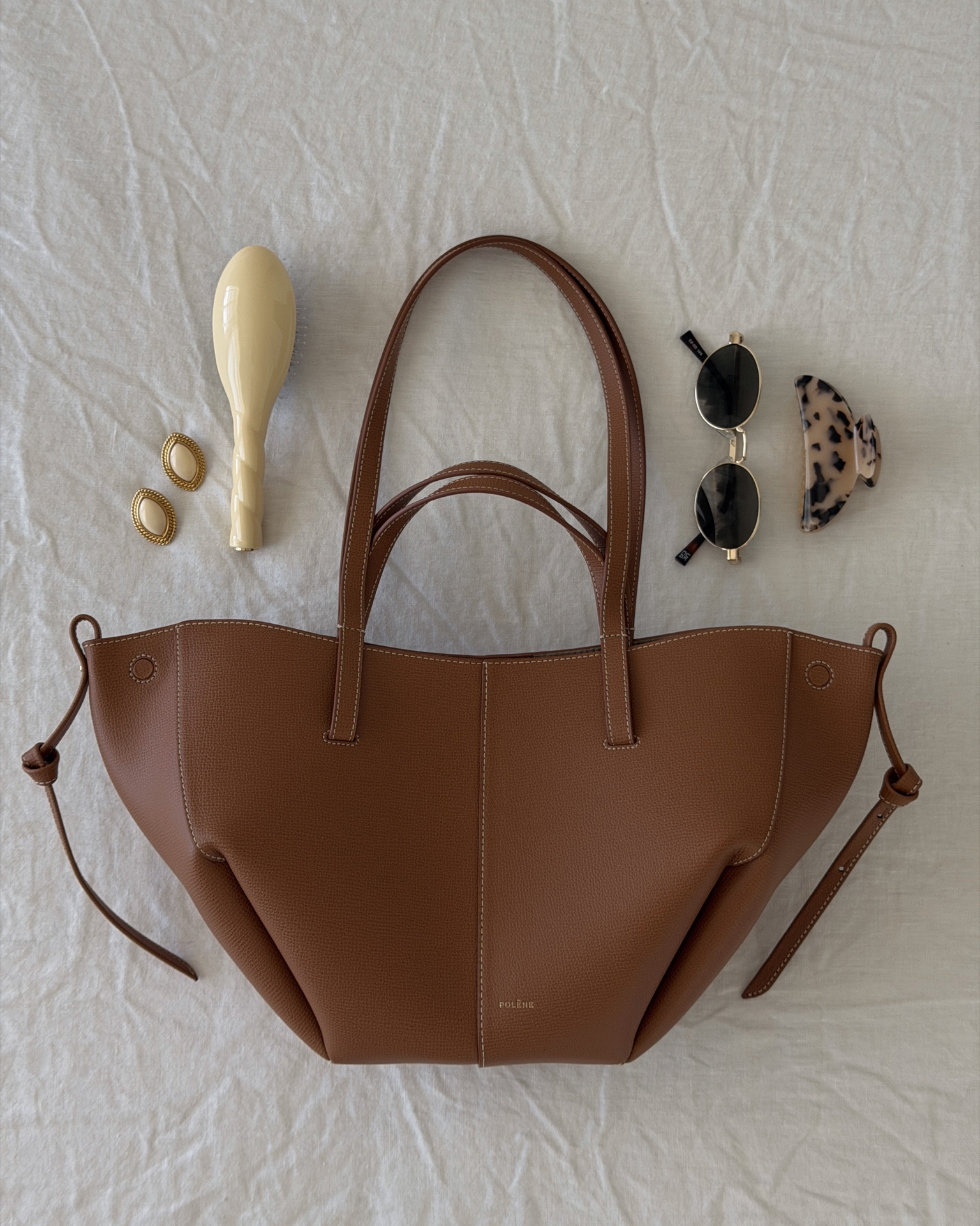 What I Brought Back from Paris 🤍

The pieces I found in Paris, from timeless handbags and French beauty favorites to a few unexpected discoveries along the way

Featured here:
• Polène Cyme Mini • @ATELIERS AUGUSTE Le Mini Marly • Lancaster Clutch • Fleuron Silk Scarf • @SEZANE Linen Dress • La Bonne Brosse N°3 Brush + Travel Pouch • Officine Universelle Buly Hand Cream • Embryolisse Lait-Crème Sensitive • Two La Petite Étoile Blouses

I’ve added some of the other items featured as well in case!

📍 Discover the full edit now live on maevawithamour.com, where I share everything I found in Paris, the stories behind each piece, shopping tips, my Paris shopping map, and you can also shop the finds along with a few additional favorites 

🤍 You can also find the complete edit and more on ShopMy @ maevawithamour under ‘Travel’ - link in bio 

👉 Save and follow along for more French-inspired style, thoughtful edits, and wardrobe ideas designed to elevate your everyday

With Amour, M. 

#parisianstyle #frenchstyle #parisshopping