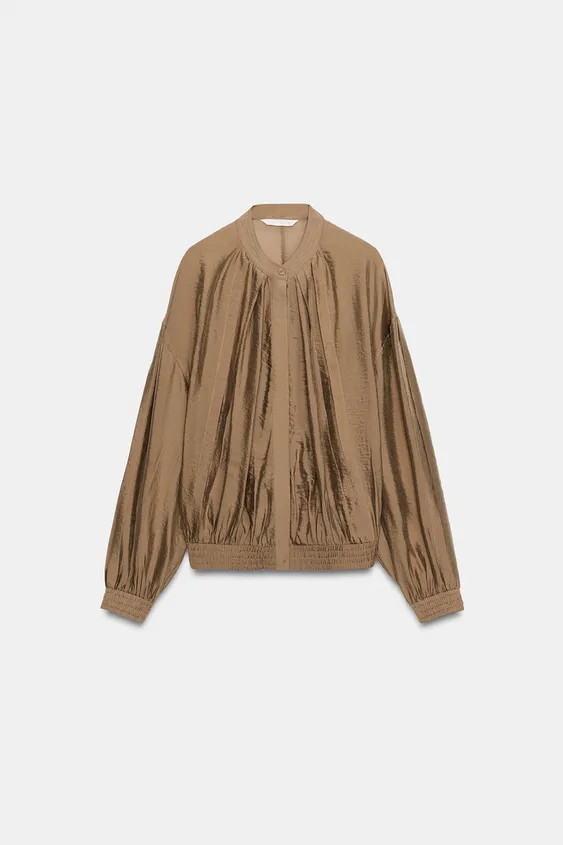 ZARA WOMAN COLLECTIONShirt made from a viscose blend yarn. Featuring a round neck and long sleeve... | Zara UK