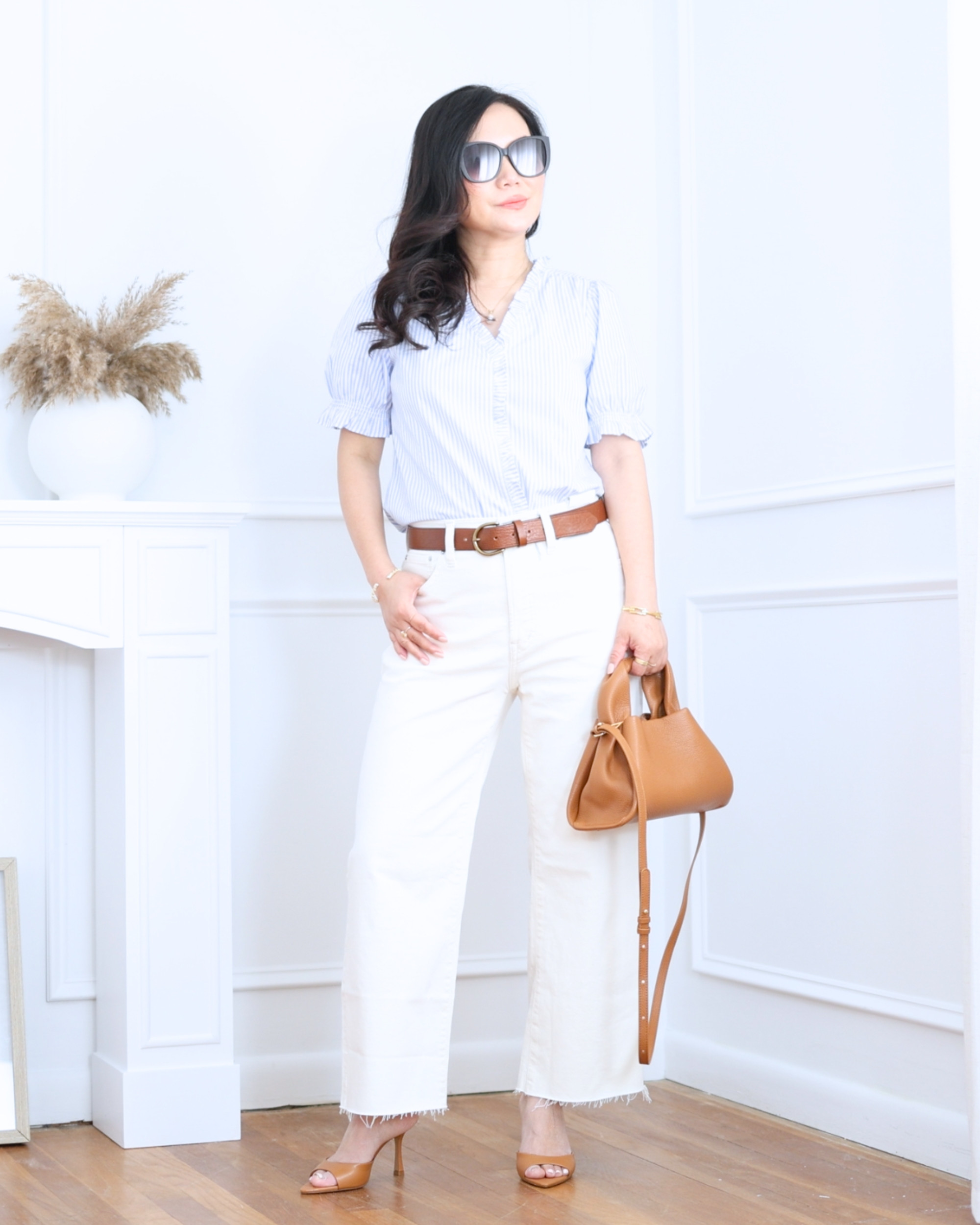 Light blue top from Uniqlo paired with white jeans from Madewell — fresh, crisp, and effortlessly put together. A simple combination that feels bright, relaxed, and perfect for sunny days. I'm 5'2, wearing size S. 

 #LTKootd #LTKOver40 #LTKPetite