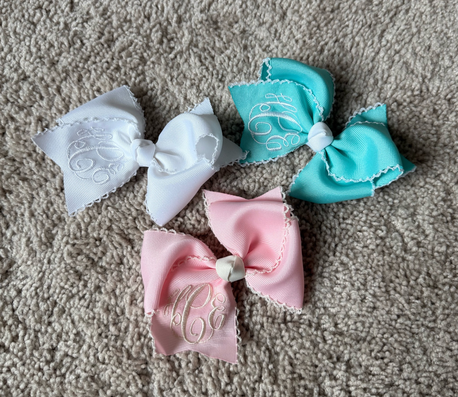 4 inch bows in the colors white/white, aqua/white & pink/ivory

#LTKBaby #LTKFamily #LTKKids