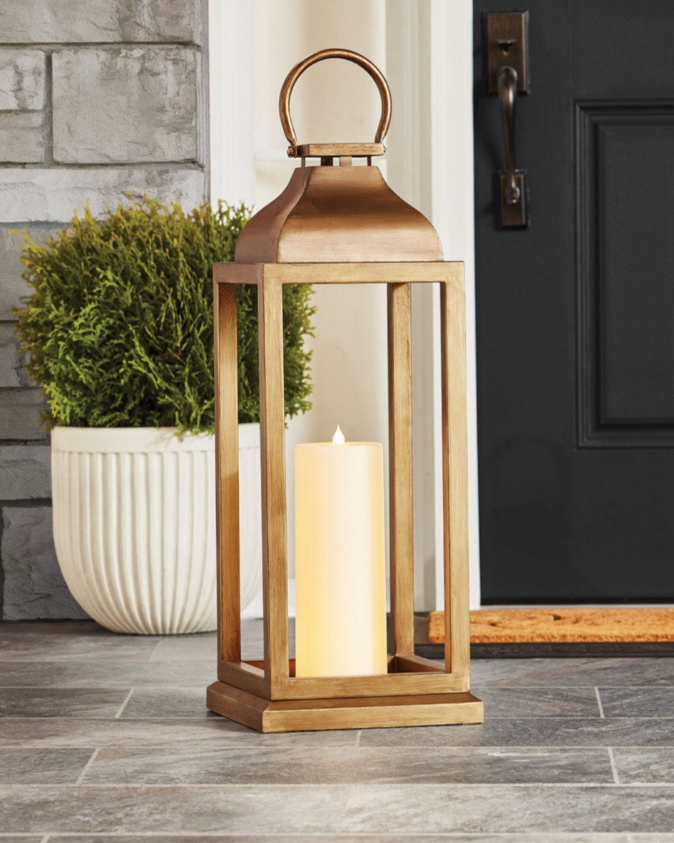 ✨ Limited Time Sale ✨This 28" Bronze Lantern with Flameless Pillar Candle features an iron frame in a gorgeous bronzed finish. The weather-resistant, powder-coated finish makes it ideal for a garden, patio, swimming pool area, or outdoor events. The open frame lantern is without glass so it’s an excellent option around pools or children. 
The outdoor lantern includes a 12" high LED candle with flicker light with a convenient timer functioned for 6 hours ON and 18 hours OFF.

#LTKHome #LTKSaleAlert #LTKSeasonal