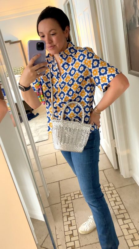 Medallion print collared button down top that’s a touch boxy but so cute! Linen print top for summer. Wearing a US8 from Boden. On sale for $54  
Paired with a metallic woven crossbody purse that’s on sale! Add the additional 50% off code at checkout and it’s under $60. 
Mother kick flare denim and Veja sneakers 
Mom on the go outfit, casual summer outfit, weekend style, travel outfit 


#LTKItBag #LTKSaleAlert #LTKSeasonal