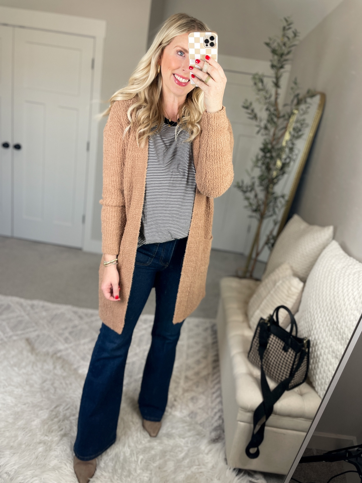Daily try on, Walmart outfit, Walmart fashion, time and tru, blanket cardigan, flare jeans 

S cardi 
0X tee

#LTKfindsunder50 #LTKSeasonal #LTKshoecrush