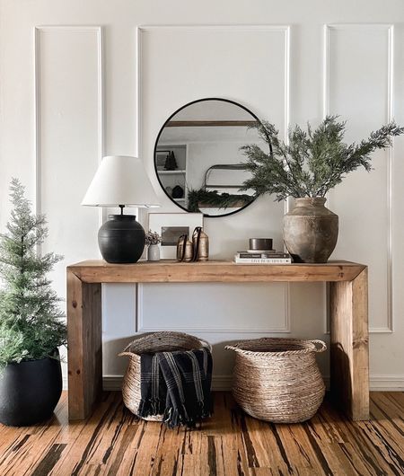 Christmas entryway 

Couldn’t decide between the oversized cedar branches or the tree…
my 3 essentials: greens + bells + ribbon it’s the perfect combo every time. so the more the merrier this year🌲🌲🌲

#LTKhome #LTKsalealert #LTKHoliday