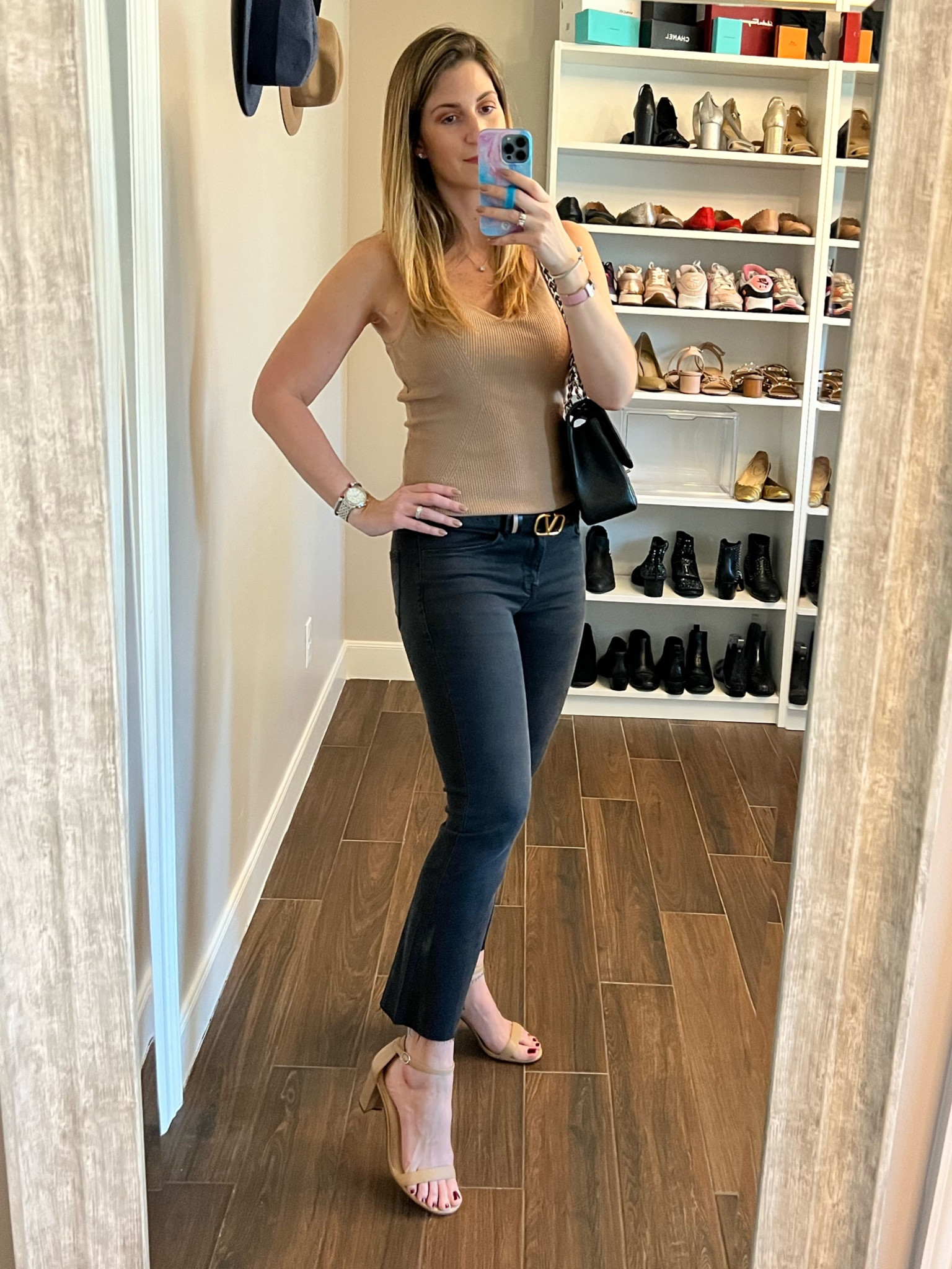Sporting new demi boot crop jeans. This faded black wash is perfect for day or night. Runs TTS. 

This knit top is so comfy and flattering. Comes in 3 other colors! Runs TTS. Wearing size small. (If in between sizes size down.)