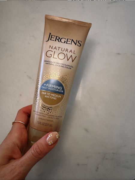 WHO ELSE IS THEIR BEST SELF WITH A LITTLE TAN? You all had asked me to find a good drugstore self tanner & Jergens has always been my go to brand for an affordable glow. I've used their products for years! The Jergens Natural Glow Moisturizer gives you a flawless, natural looking glow. It's also firming & helps reduce the appearance of cellulite! It has a light, fresh scent that is really nice & not overpowering, which is key for me- especially right now. 

#LTKBeauty #LTKStyleTip