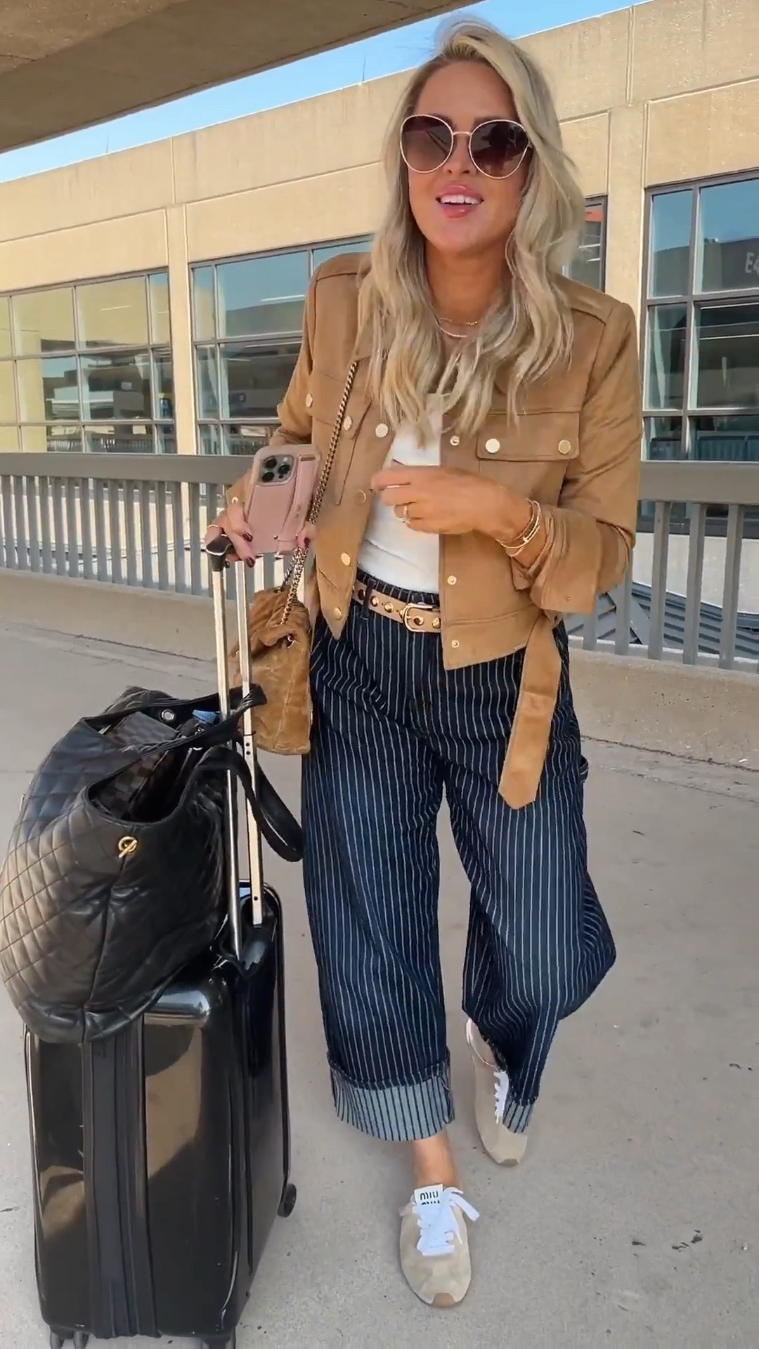 My suede jacket is 40% off today and my jeans are on a RARE 30% off sale. Use code: ANTHRO30. It’s a great work friendly option! 🔥
Love the button details that make it office friendly too! Little on the dressier side. 
I did small. 

Luggage. Travel. Travel outfit. Fall style. Fall outfit. Suede jacket.  

#LTKHoliday #LTKSaleAlert #LTKCyberWeek