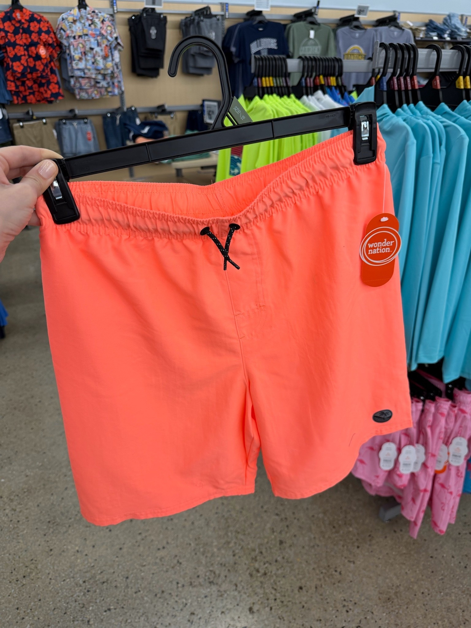 Bright orange is one of the safest colors for swimweat which is why I love these neon boys swim trunks at Walmart! #walmartkids