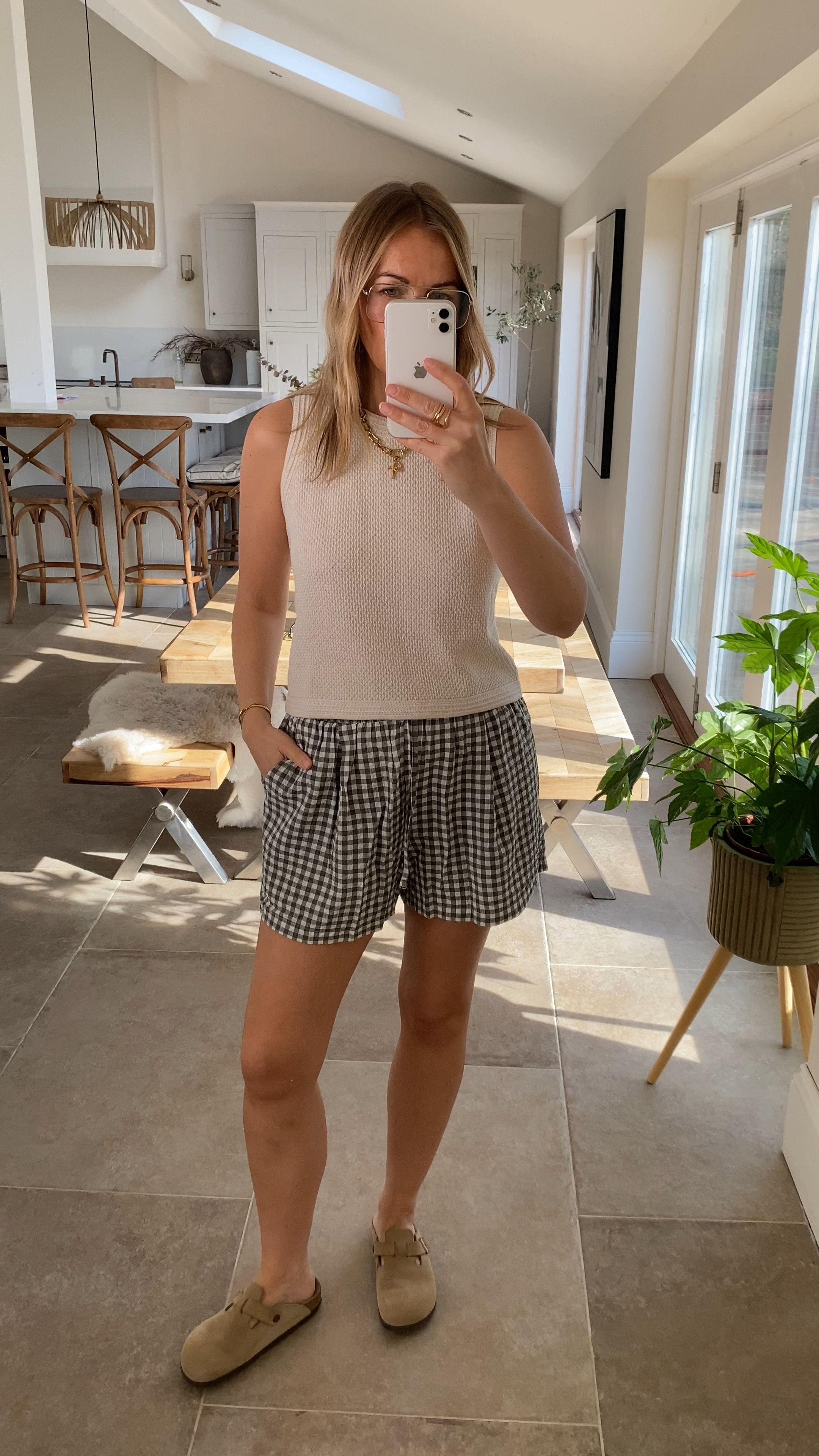 Styling that knitted tank with these lovely gingham check shorts (light and comfortable in a textured fabric) 
Wearing a large in both 
Top is semi fitted and shorts loose fit with a tie waist. 

#LTKtravel #LTKuk #LTKspring