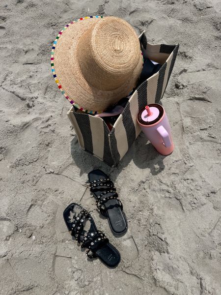 Beach supplies 
Bucket hat
Sandals 
Stripe beach bag 
Brumate 

#LTKover40 #LTKtravel #LTKswim