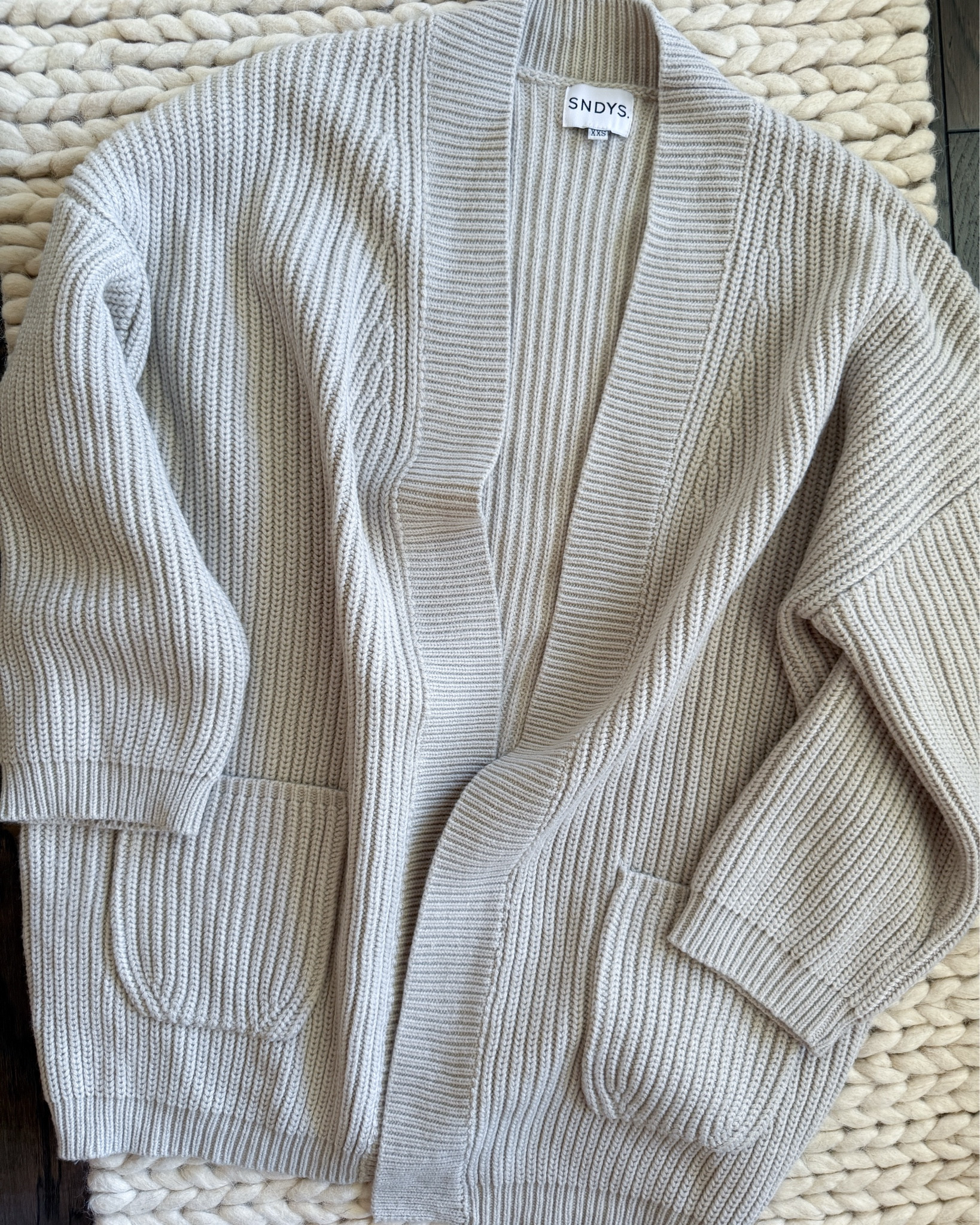 A neutral cardigan moment I’ll be wearing on repeat. This SNDYS. sweater from Revolve is the perfect blend of cozy & structured with soft knit & oversized sleeves. I got size XXS & it’s still the slouchy vibe I love without drowning me. Easy to throw on over a tank or dress for cool summer nights, errands, or travel days. You know I love a piece that feels casual but looks elevated.

sndys sweater cardigan – revolve neutral cardigan – lightweight summer layer – slouchy knit sweater – everyday knitwear – neutral outfit staple – cute cardigans for women – casual but elevated look – oversized sleeve cardigan – travel day outfit – capsule wardrobe cardigan – sndys revolve find – soft knit cardigan – cozy layering piece – summer to fall cardigan

#LTKSummerEdit #LTKStyleTip #LTKWorkwear