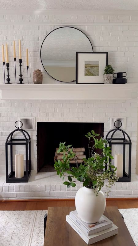 LISTEN!!! @samsclub came through again with these great finds!

These 28-inch black metal lanterns with frameless pillar candles are the perfect addition to our simple and understated fireplace decor this year. 

#LTKstyletip #LTKSpringSale #LTKhome