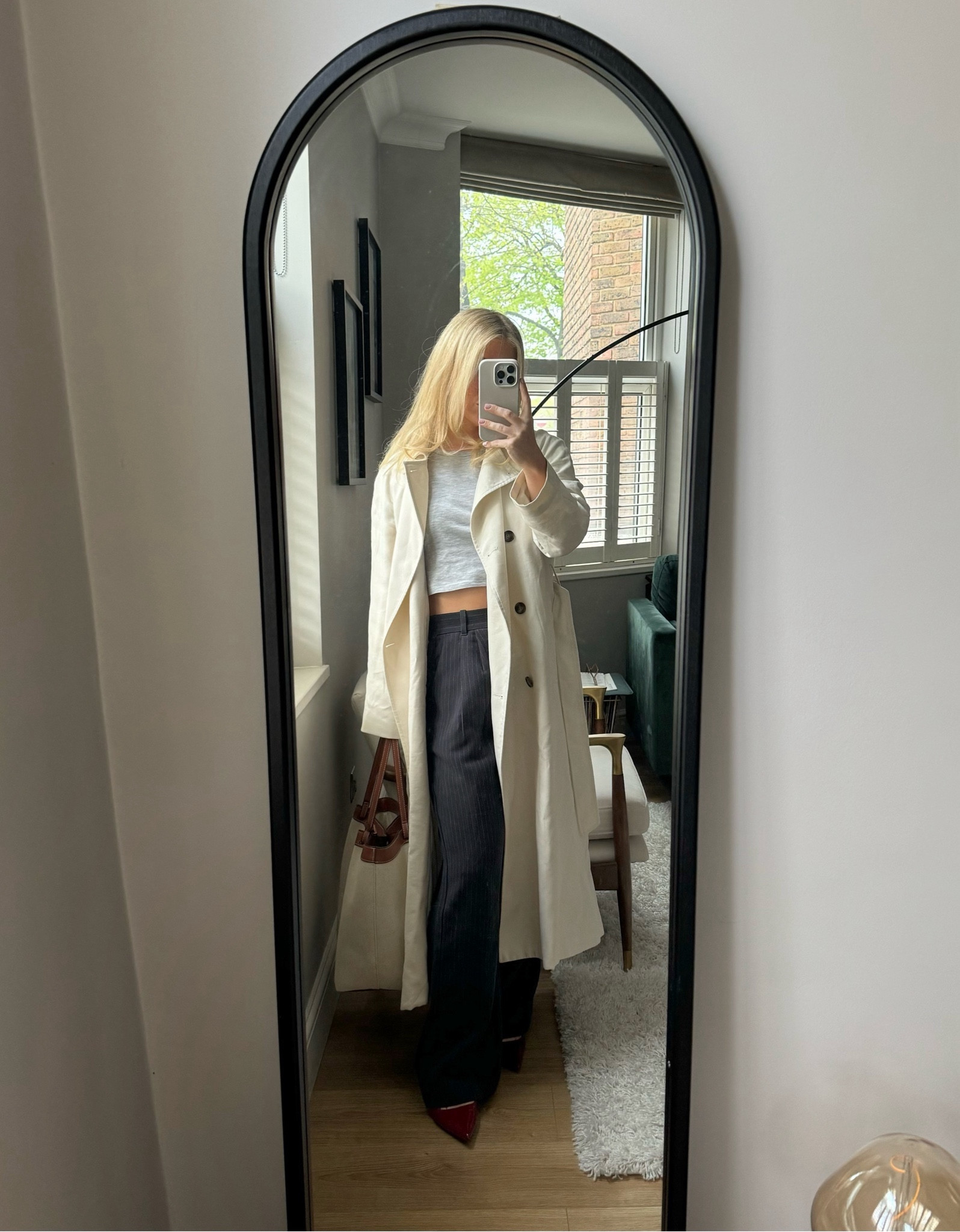 Work or smart casual! Pinstripe wide leg trouser with a cropped tee and a Flowy cream trench coat. Also love this canvas bag with it for spring vibes.

#LTKworkwear #LTKsalealert #LTKSeasonal