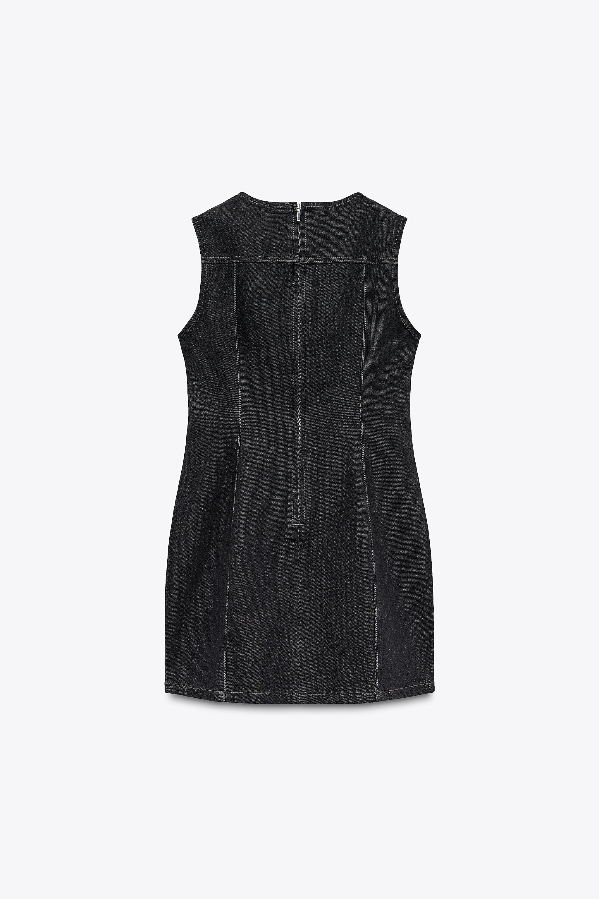 Short dress made from a cotton blend. Round neck and sleeveless. Features topstitching. Zip faste... | Zara UK