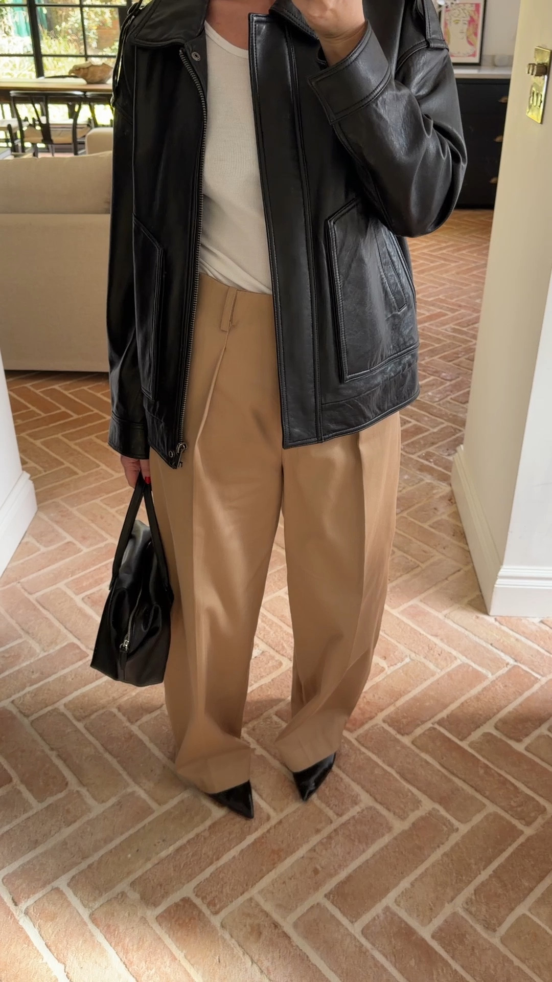 Current favourite colour combination - black + beige | beige trousers | leather jacket | spring outfit 

#LTKstyletip #LTKeurope #LTKspring