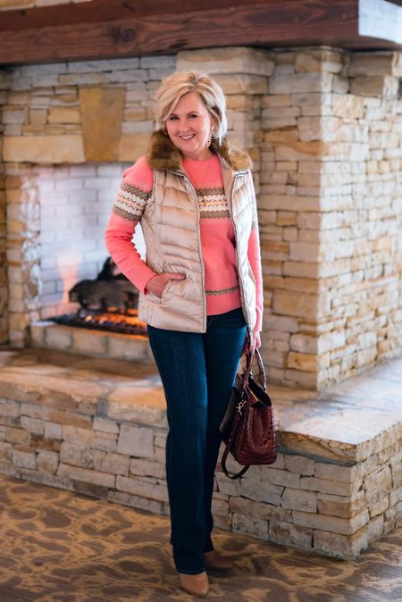 Today’s outfit is the perfect cozy and colorful outfit for work! I love the colors in this fair isle sweater and this faux-fur puffer vest is a gorgeous layer. 50 is not old | holiday outfit | jeans for women 

#LTKworkwear #LTKHoliday #LTKSeasonal