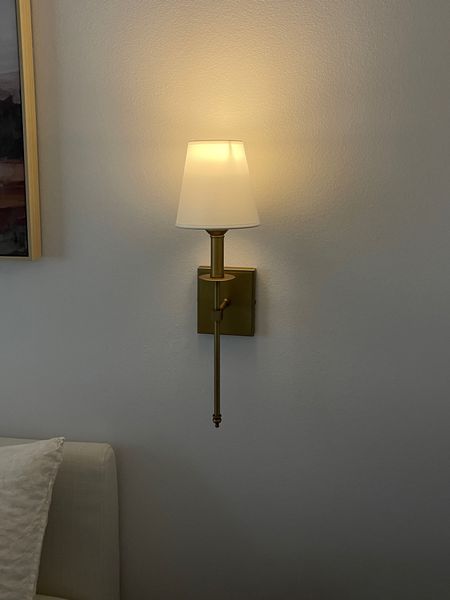 Amazon brass sconce, battery lightbulbs for a faux sconce look without hard wiring! 

#LTKhome #LTKunder100