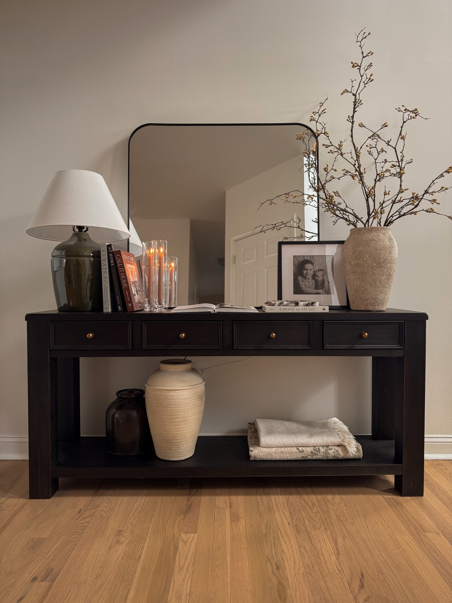 Spring decor, entryway decor, entryway console table, console table styling, sideboard decor, table lamp, entryway lamp, entryway mirror, spring stems