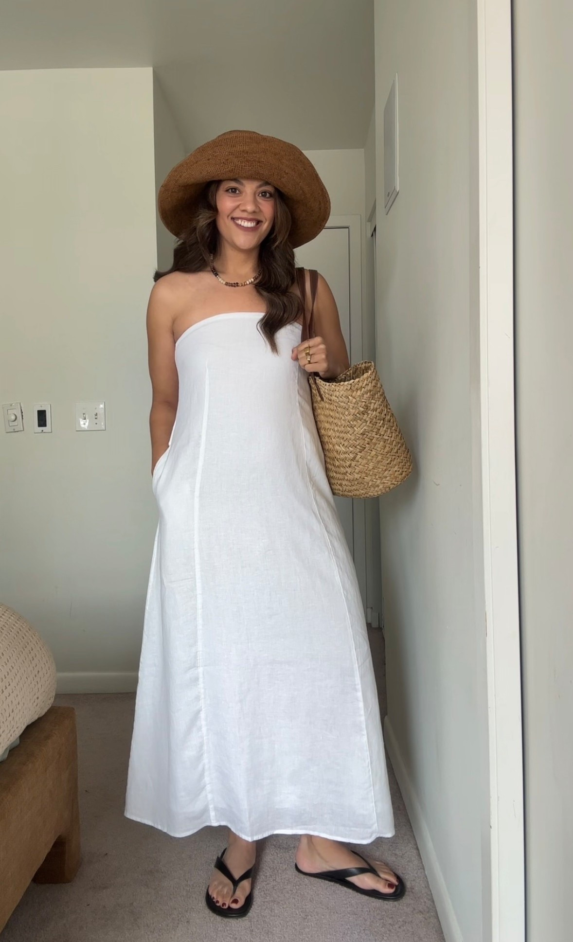 Summer dress outfit!
-Quince white linen strapless dress, size medium. 
-Aritzia brown straw hat. 
-Zara black flip flops. 
-Gap straw tote bag. 
-Anthropologie beaded necklace.

#LTKsummer #LTKdresses #LTKstyletip