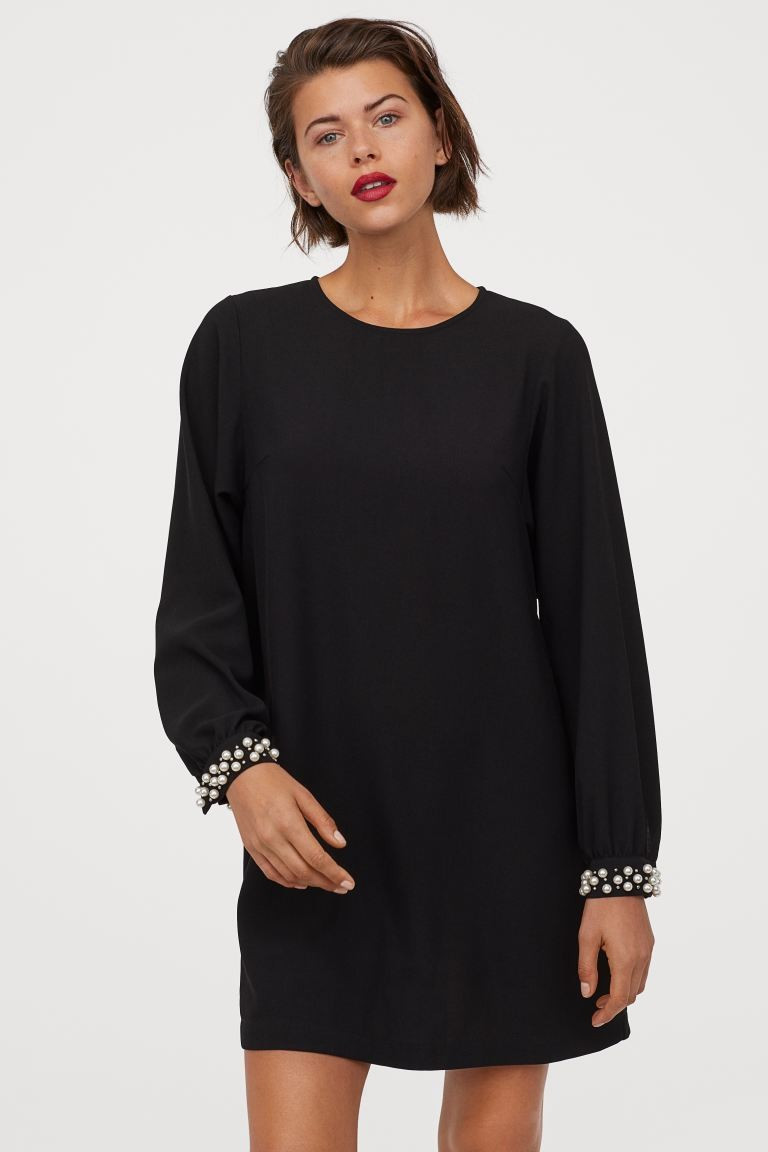 Short, wide-cut dress in woven fabric. Round neckline, small opening at back of neck with button,... | H&M (US + CA)