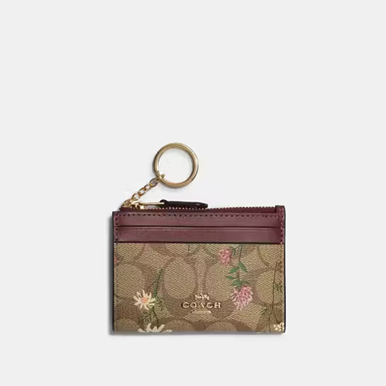 Mini Skinny Id Case In Signature Canvas With Wildflower Print | Coach Outlet US
