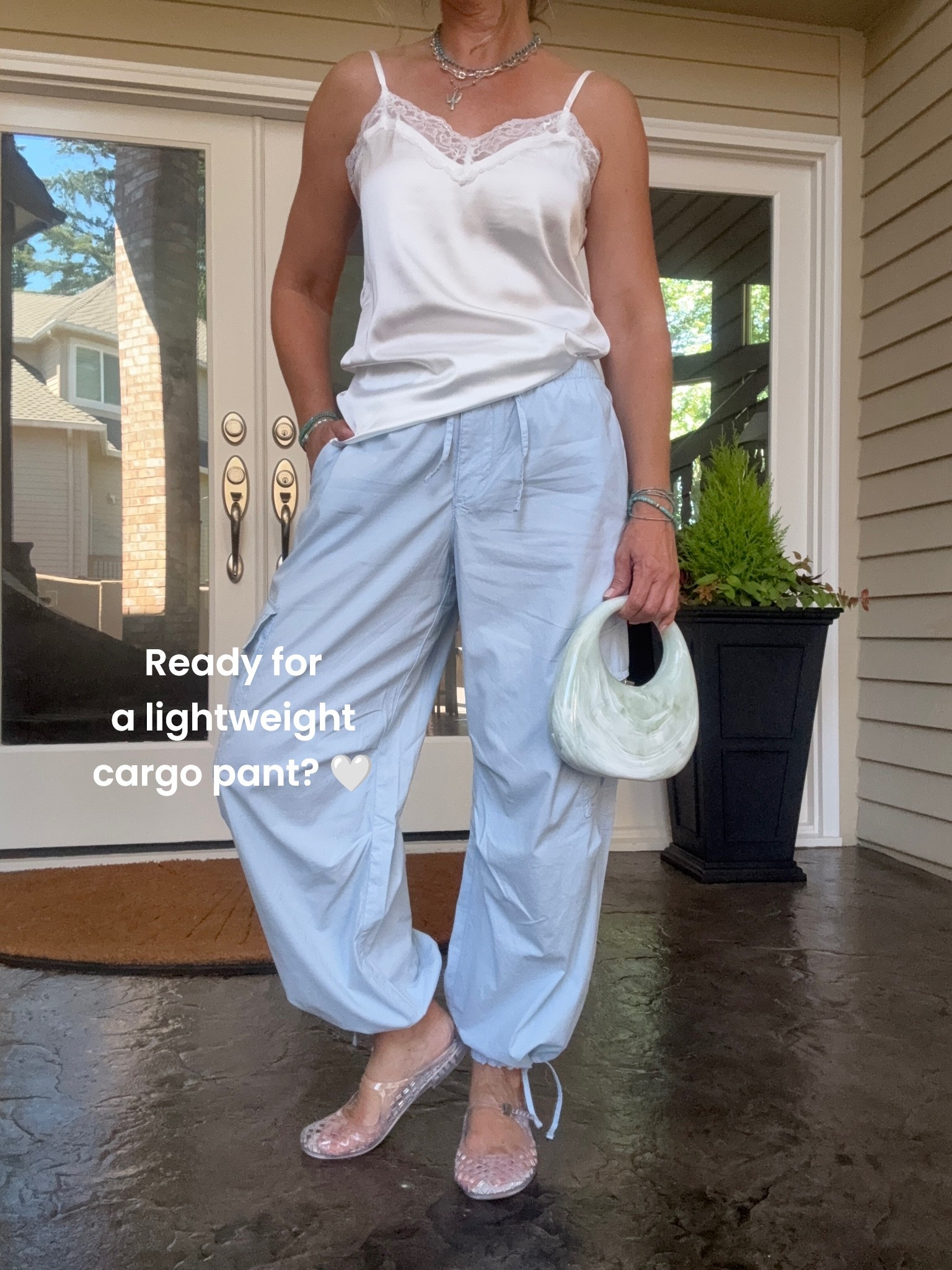 These light blue cargo pants are a summer staple 🩵 Lightweight, breathable, and a hint of stretch. An adjustable drawstring on the cuffs creates two looks - a balloon silhouette or wear untied for a relaxed fit. These are oversized - I sized down one size…wearing an xs.

#LTKSaleAlert #LTKootd
