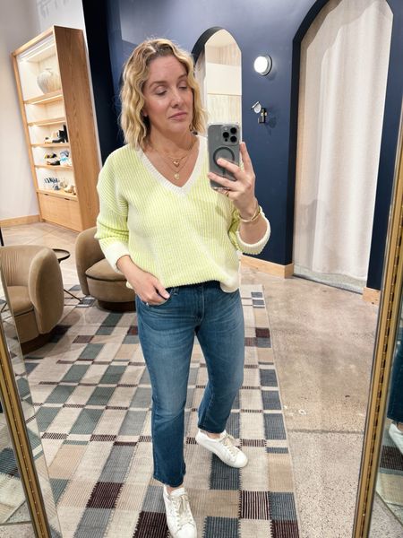 Spring outdoor event look: fresh v-neck sweater, dark cropped denim, white sneakers. Love this color for Spring! This exact sneaker sold out but linking  super similar. Sweater runs large- size down one. Jeans tts. Allison in a small on top and a 29 in the jeans 

#LTKSeasonal #LTKstyletip #LTKover40