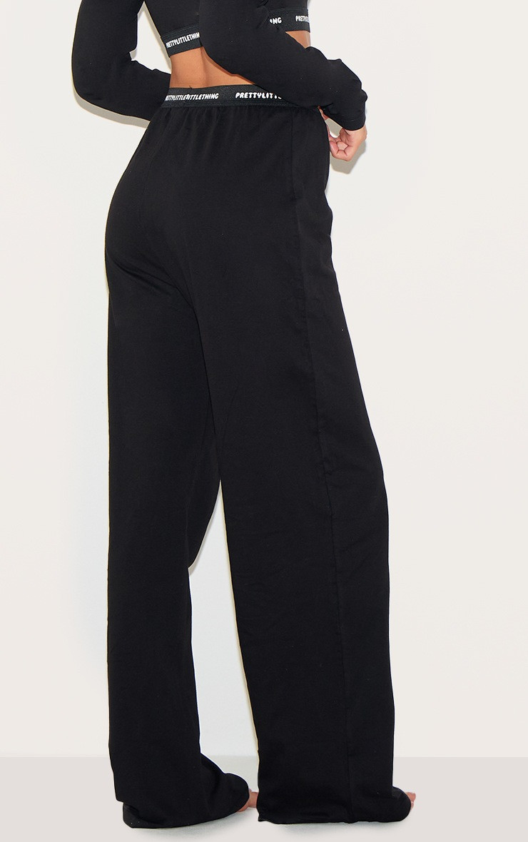 PRETTYLITTLETHING Tape Black PJ Pants | PrettyLittleThing US