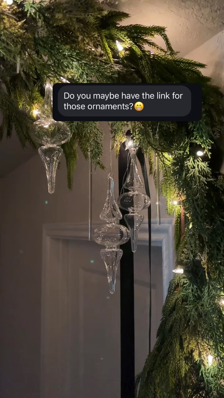 Tension rod garland hack with cedar and Norfolk pine garland, green velvet ribbon and clear hand blown glass ornaments 

#LTKVideo #LTKHoliday #LTKHome