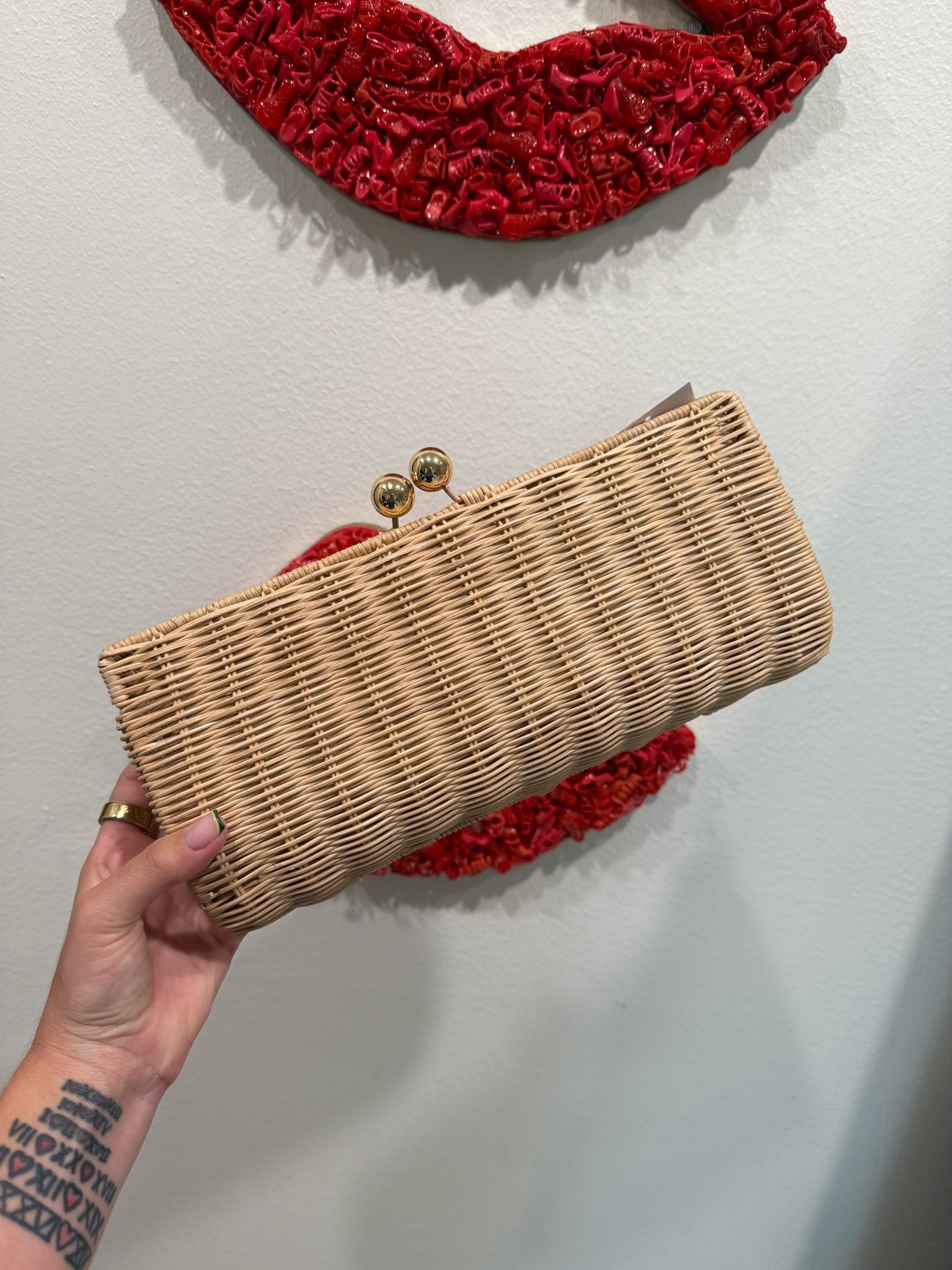 Found my new favorite bag for every "dressed up but make it effortless" moment 🤍 This rattan clutch is giving vacation main character energy — the gold ball clasp is such a good detail and it's under $70! Linked below, styling this with everything from linen sets to date night looks. Grab it before it sells out! 

 