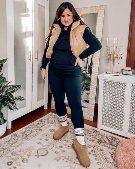 Comfy casual outfit in amazon from head to toe featuring the amazon ugh mini dupes. 

Black leggings, black hoodie, tan cropped puffer vest, tube socks 

#LTKshoecrush #LTKstyletip #LTKcurves