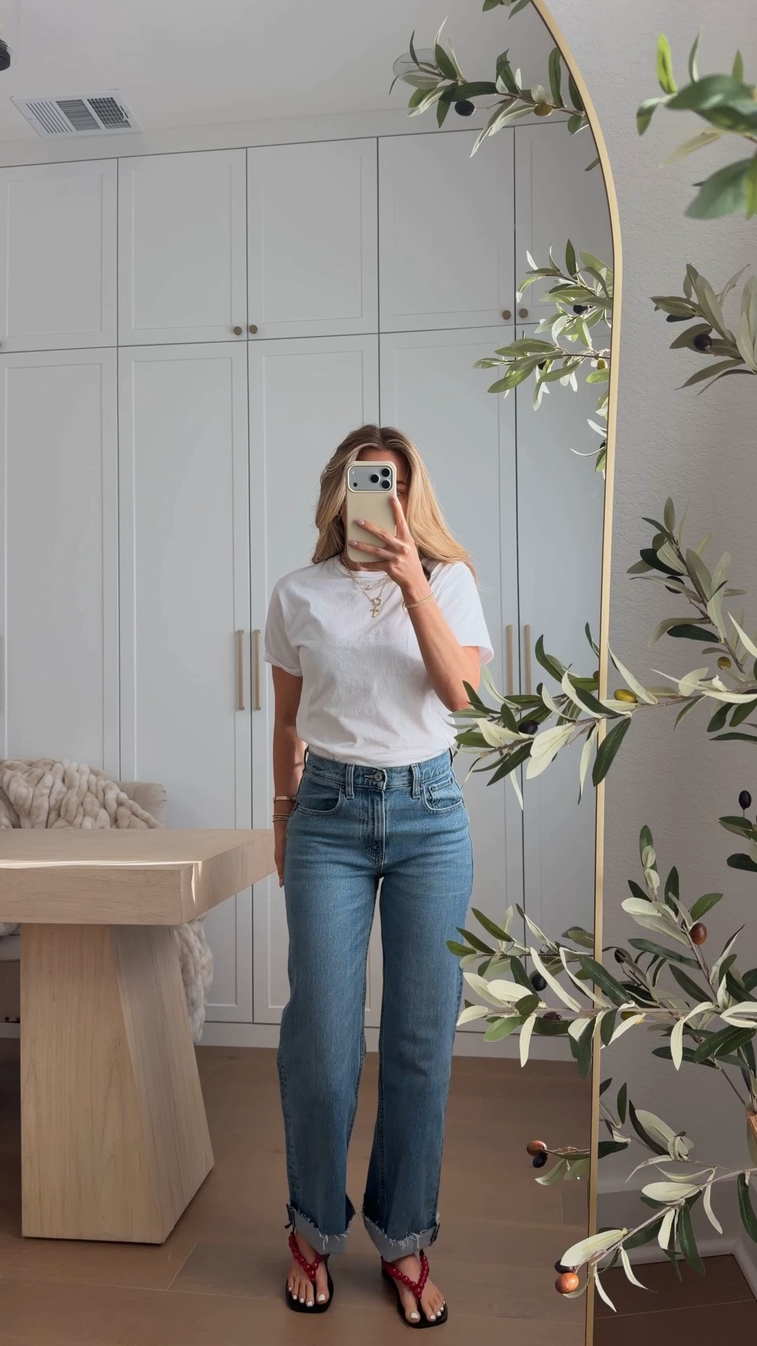 tee: xs // jeans: 24 short (i cuffed them) i’m 5’3. last day to use code DENIMAF // sandals are NOT comfortable 🥲