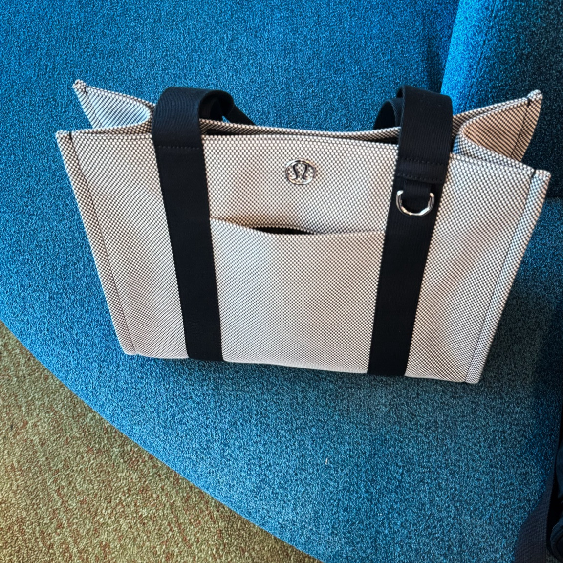 Spacious tote I’ve been traveling with! Roomy for books, iPad, phone,  water bottle + more! I love the inside pockets along the width of the bag AND side lengths - 4 deep pockets too! 





#LTKStyleTip #LTKFindsUnder100 #LTKGiftGuide