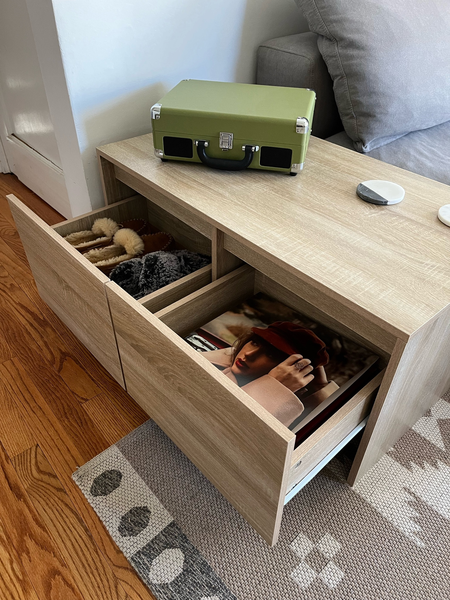 In LOVE with our new end table + with our cutie new record player too 🎶

Pros:

💚 No filter in only natural light to show true finish! The color is perfection + the wood texture looks so real. It’s a great natural white oak alternative.

💚 A complete steal at $134!

💚 True size: 35-7/16”W x 19-13/16”D x 16-5/16”H [trust me.. measuring things is my job]

💚 An end table with storage was a must in our tiny living room. I love love love these drawers. 

💚 It is technically a coffee table which means all sides are finished + beautiful!

💚 See more angles of this piece on my feed!

Cons:

1️⃣ It took a long time to assemble. 

2️⃣ We knew this going in, but the finish is not super durable. Our first shipment had some damage, so we needed to exchange it for another. But since then, no sign of wear + tear at all!

All in all, both cons were 100% worth the extremely affordable price. We are so happy with it + it really levels up our space ✨

coffee table with drawers, sled coffee table drawers, affordable white oak coffee table, white oak veneer, modern white oak coffee table, modern coffee table storage, rectangular coffee table storage, latitude run Sonoma oak, latitude run coffee table white chipboard, vidaxl coffee table Sonoma oak, vidaxl coffee table drawers, 3’ coffee table, 36” coffee table, small living room coffee table, small living room ideas, minimal coffee table, minimalist coffee table, minimalistic coffee table, minimalism coffee table

#LTKFind #LTKhome